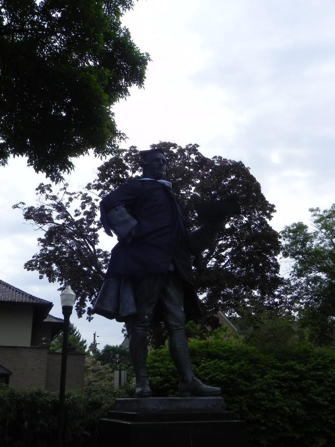 As a part of the commencement festivities, the statue of John Wilkes on the center of campus was dressed up in formal academic graduation attire. 