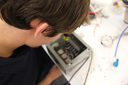 Dan Lykens at work during his internship with Entrepix in Mesa, Ariz.