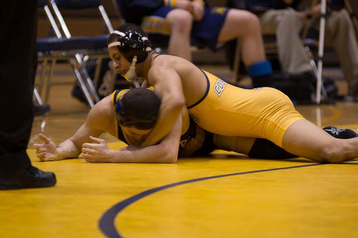 The Wilkes University wrestling team won the 800th match in the program’s history Feb. 14 against Ithaca. Here, sophomore Guesseppe Rea pins his opponent.