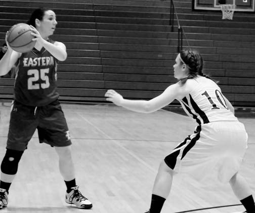 Junior Guard Elena Stambone guards an Eastern player as she looks for a teammate to pass to.