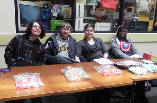 Members of the ‘History Club’ work their bake sale during club members to raise money. From left to right, Rachel Rakowski, Andrew Paski, Ashley Rash, and Melissa Thorne. 