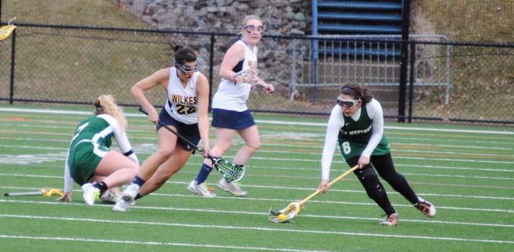 Senior midfielder Gabby Ford, #22, above, has been one of the leading scorers for the Lady Colonels’ undefeated lacrosse team.