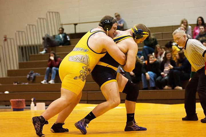 Senior heavyweight William Fletcher, shown in action here against King’s College, is one of six Wilkes University wrestlers competing for title in the NCAA National Championships.