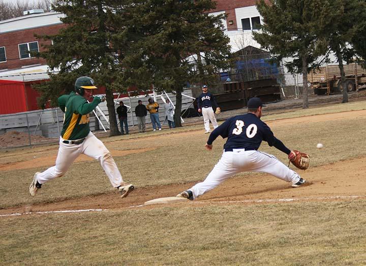 Sophomore first baseman Bobby OKeefe reaches for the ball.