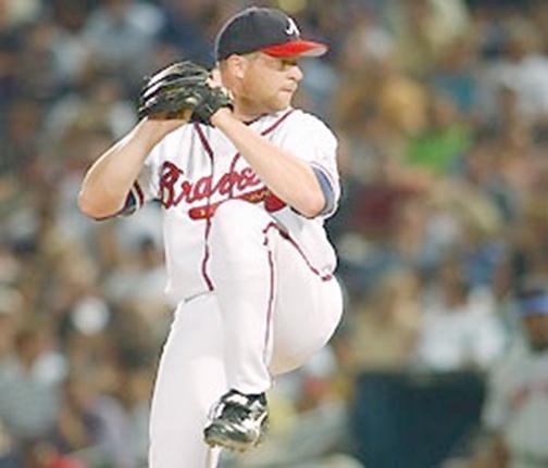 Gryboski pitching for the Atlanta Braves throughout his MLB career.