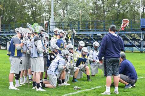 Men’s Lacrosse practice concluding with Coach Jaques speaking to his players.