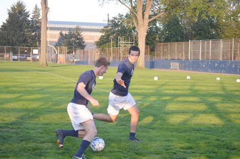 Men’s soccer members perfect drills in pairs at a recent practice.