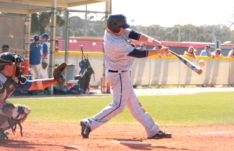 Josh Slocum hits a fly to take the lead in game one of Del Val series.