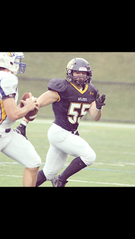 Michael Condrad takes the field his sophomore year when still on the football team.