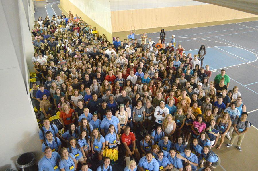 Incoming freshmen and their mentors pose during the second orientation.