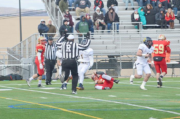 Officials work to halt the action during last years Mayors cup game.