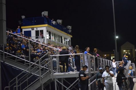 Spectators fill the newly built bleachers at the Ralston Athletic Complex.