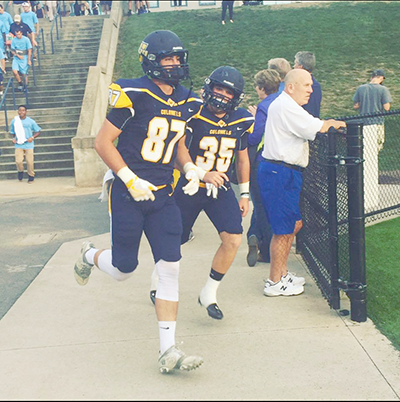 Brook and Armstrong head to the field for another game side by side.