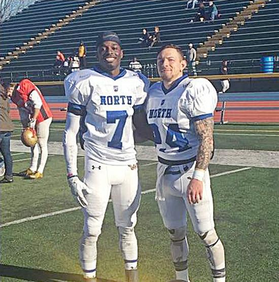 William Deemer and Marcellus Hayes show their Wilkes pride after the game