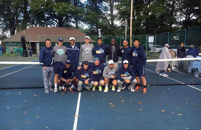 Coach Leichts Mens team celebrating a big win.