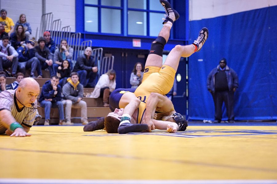 Bruised, but still cruising; Wilkes Wrestling continues to grind