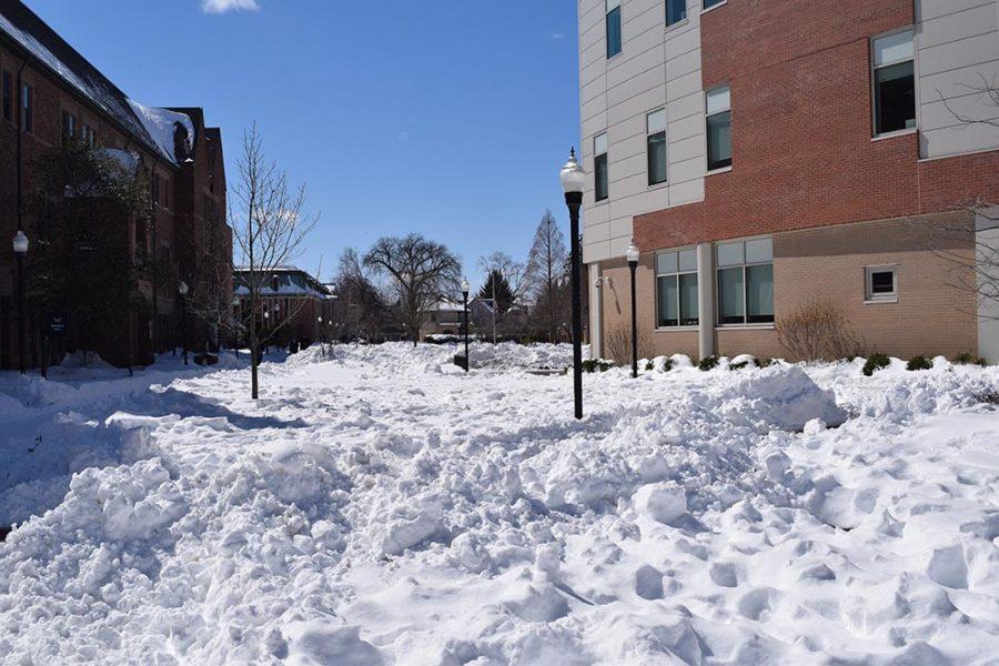 Winter+Storm+Stella+left+the+Wilkes+campus+looking+a+bit+like+a+ghost+town+with+a+four+day+snow+day+streak.+Pictured+above+is+the+back+of+the+Cohen+Science+Center%2C+with+mounds+of+snow+building.+