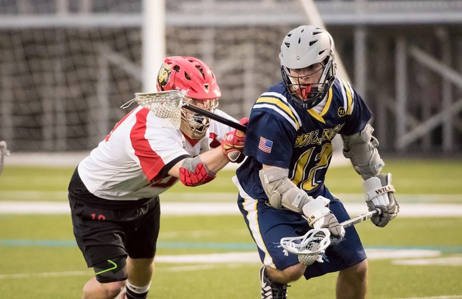 #12 Matthew Bush scored five goals in the Colonel's 10-9 victory over Rosemont earlier in the season.