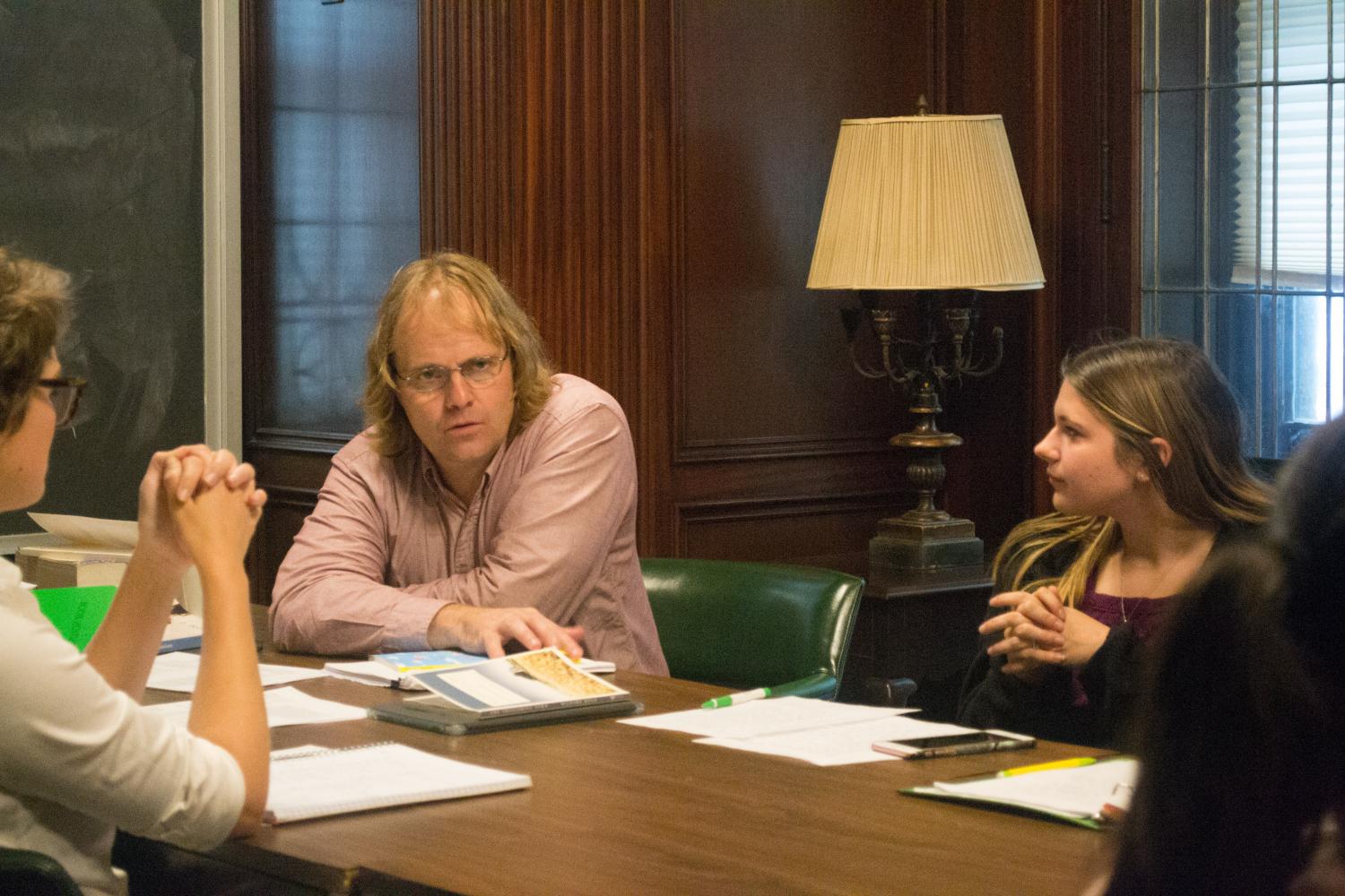 Kecli Piavis, left, and Taylor Balasavage, Right, look on as Hunley delivers his workshop.