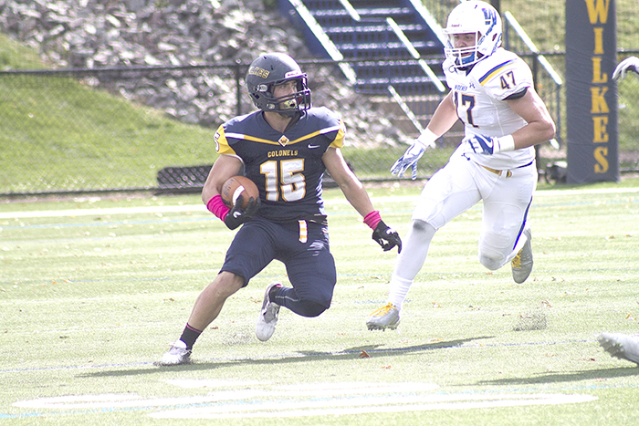 First-year wide receiver Nick Yanik (15) caught a 27-yard pass from Nick Geimer.