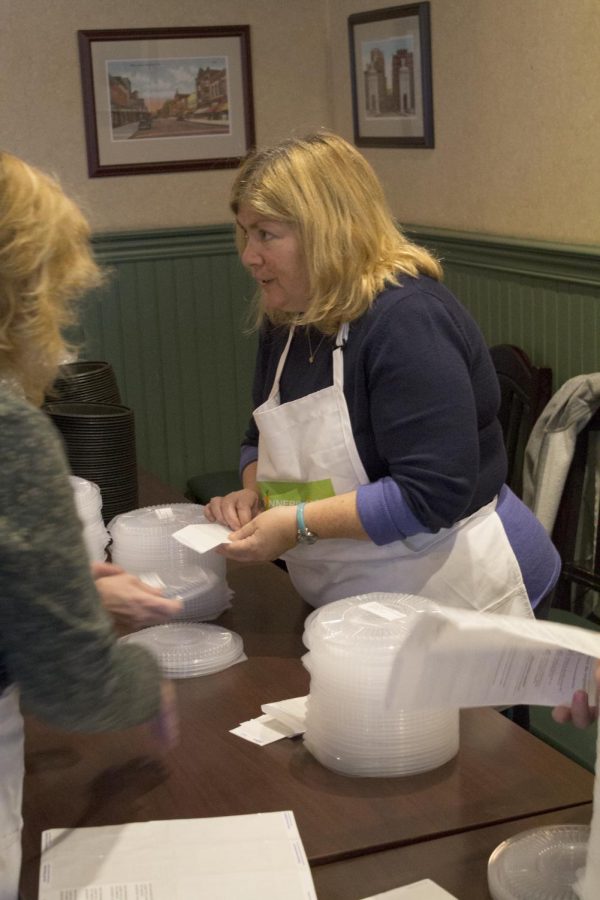 Sandi Fine is one of many retirees volunteering for Dinners for Kids. The program is currently looking for college students. 