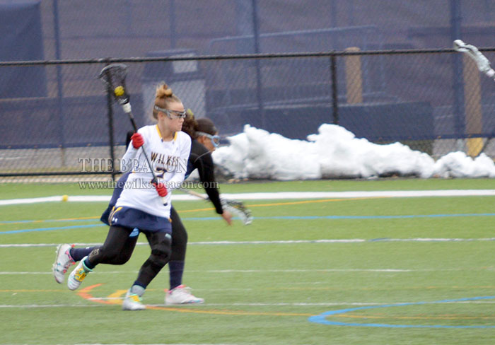 Lady Colonel freshman Sierra Duman (#2) looks across the field. 