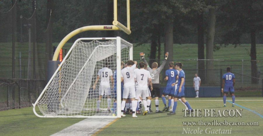 Junior midfielder Ed Lukowski tries to take advantage of a scoring opportunity with a corner kick.