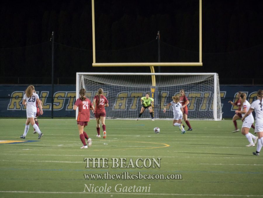 Senior Nicolette Towlen attempts to work the ball toward a good scoring area for the Colonels in their 1-0 loss Wednesday night.