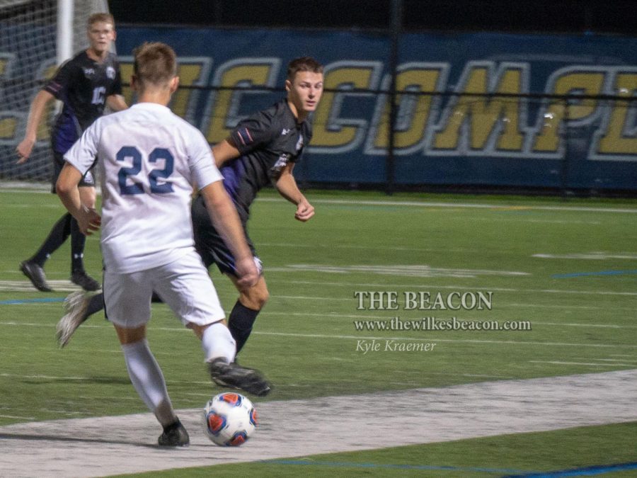 Hunter Maxwell looks to push the ball forward while running the point of the Colonels' attack during a Sept. 26 game against the University of Scranton.