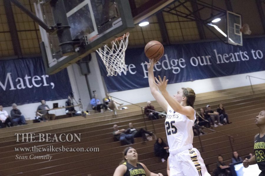 Senior forward Ashley Caster sinks a two-point shot and the and-one from the line after being fouled to stretch the Colonels lead to 24-12 in the second quarter.