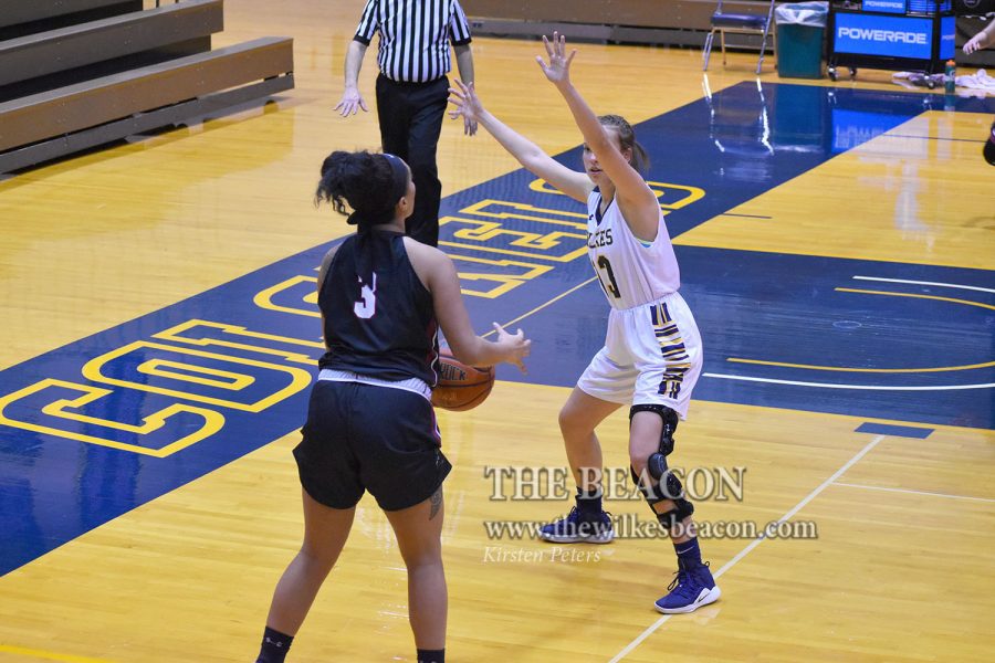 Sophomore forward Gabby Smicherko, who contributed 12 points, seven rebounds and three steals, defends Manhattanville’s Ali Mikaele who looks to take a shot from the corner. 