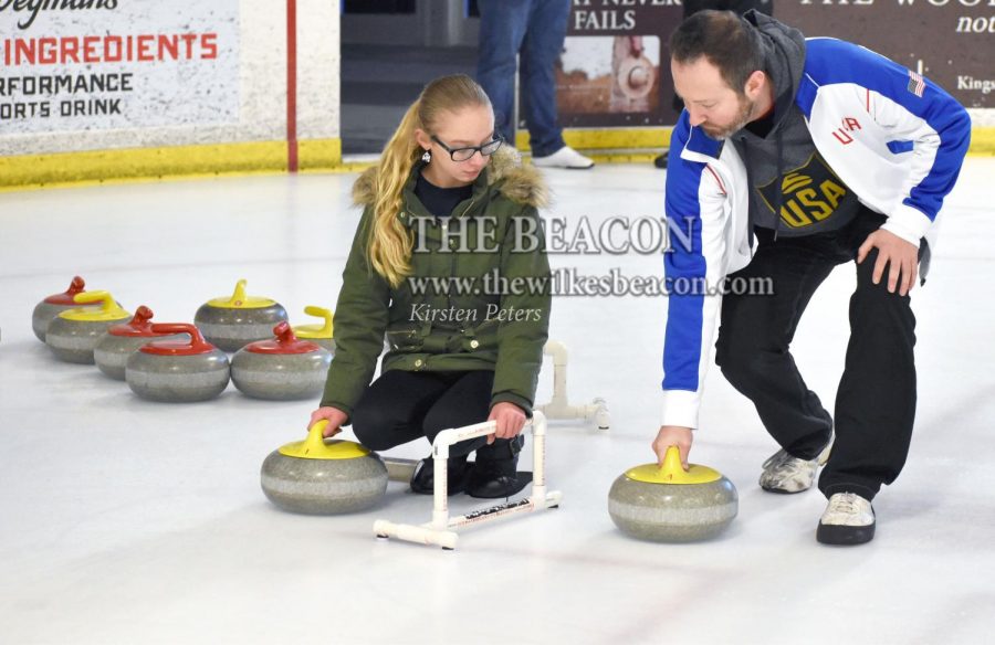 Gold medalist Tyler George gives instruction to local curlers and newbies on the fundamentals of curling at the Anthracite Curling Club open house on Feb. 1.