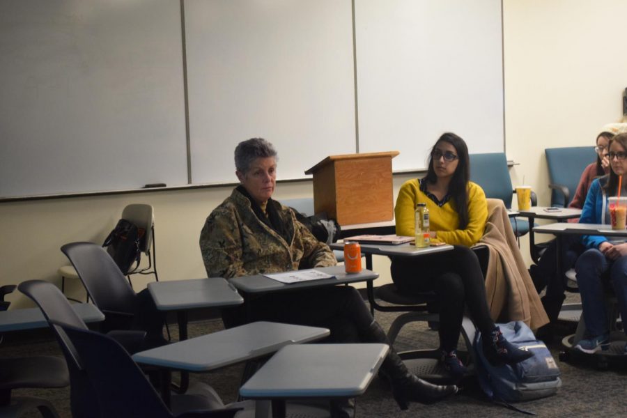 Students and faculty who attended the addiction lecture sat together with clinical social worker Beth Ann Delaney as she facilitated discussion.