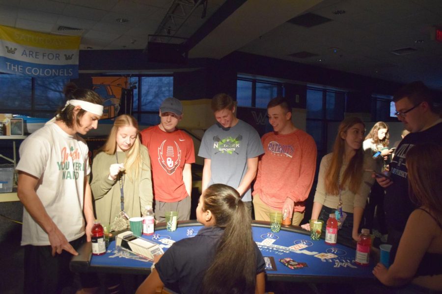 Students play blackjack at Casino Night. From left to right: freshman Josh Brown, nursing; sophomore Victoria Bilski, nursing; freshman Joey Verespey, pharmacy; freshman Bryce Yencha, pharmacy; freshman Joseph Carey, pharmacy; freshman Jennifer Gronsky, pharmacy. 