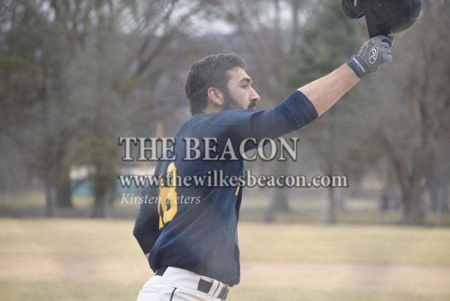 Senior+Nicholas+Capozzi+tapping+helmets+after+hitting+a+home+run+against+Eastern%2C+one+of+his+two+in+a+week+where+he+went+.545+on+11+at+bats.