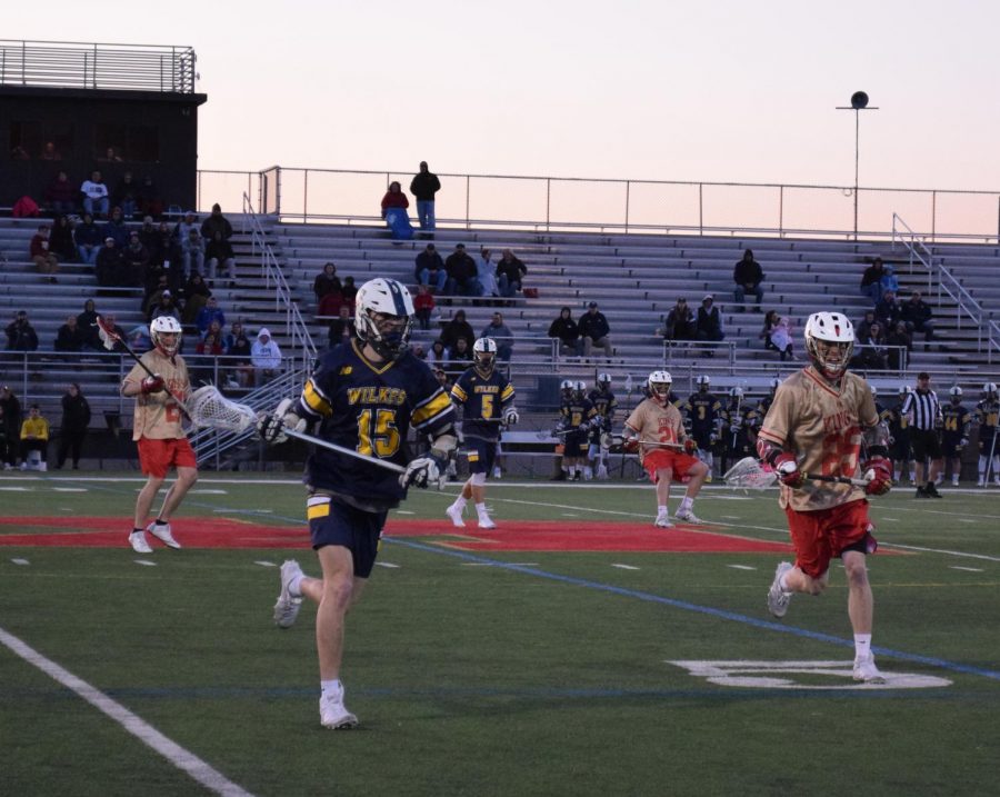 Freshman Owen Grigas gives chase to a loose ball during Wednesday night’s game against crosstown rival King’s.