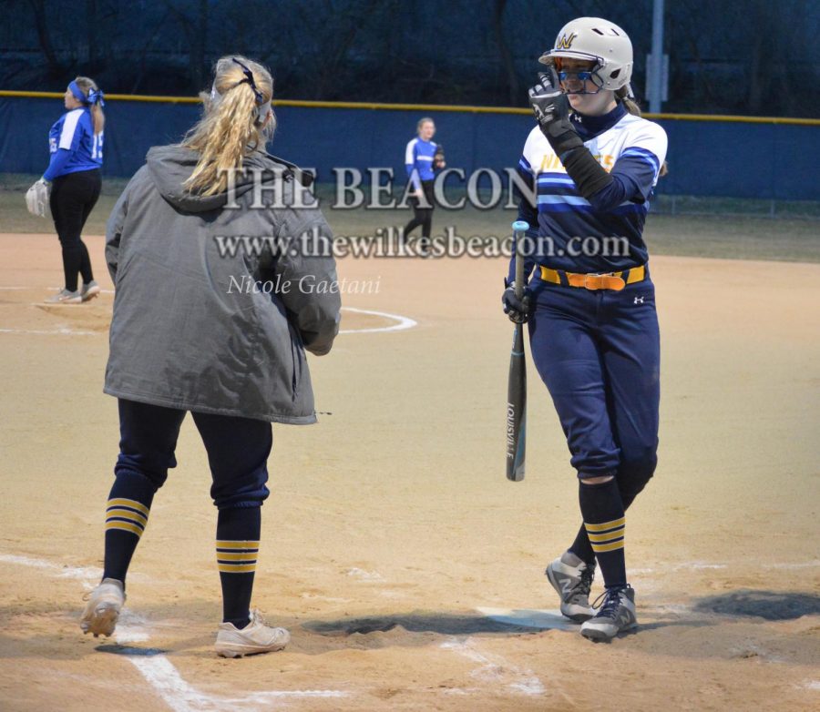 Senior outfielder Haley Welker signaled to her teammates with a smile on her face during the doubleheader against Clarks Summit last Wednesday.