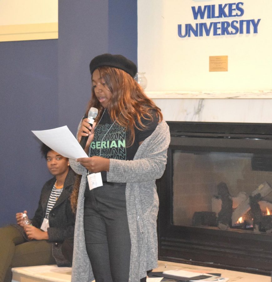 Mmachi Dimoriaku, senior theatre arts major, read a fictional story about microaggressions to the students. 