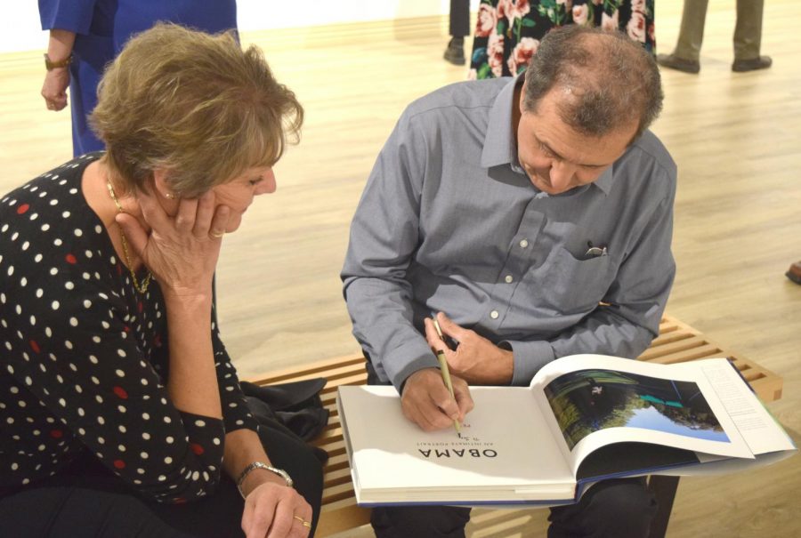 Jean Adams, pottery/ceramics instructor for Wilkes University, has her copy of “Obama: An Intimate Portrait: The Historic Presidency in Photographs”  signed by Pete Souza.