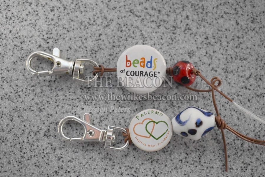 Wilkes football is participating in the Beads of Courage charity by displaying their beads on keychains or backpacks.
