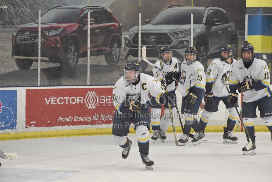 Sophomore captain Tyson Araujo celebrates his second of three goals with his team against SUNY Canton in the season opener on Friday, Nov. 1