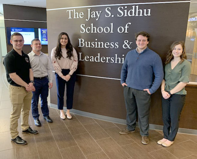 From left to right, Edward Lukowski, Nick Schepis, Taylor Akmal, Garret Gagliardi and Kacee Diehl, all student volunteers with the VITA Program.