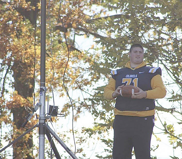 Injured Ryan Martel caught a hillside field goal attempt while video-taping the football game.