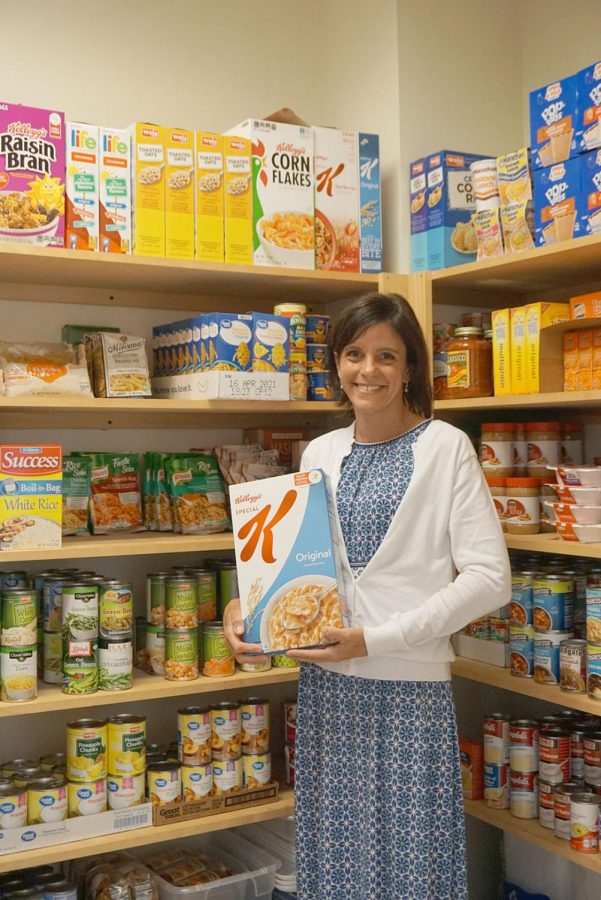 Kristin Osipower, campus interfaith coordinator, pictured in front of the Colonel’s Closet food pantry.