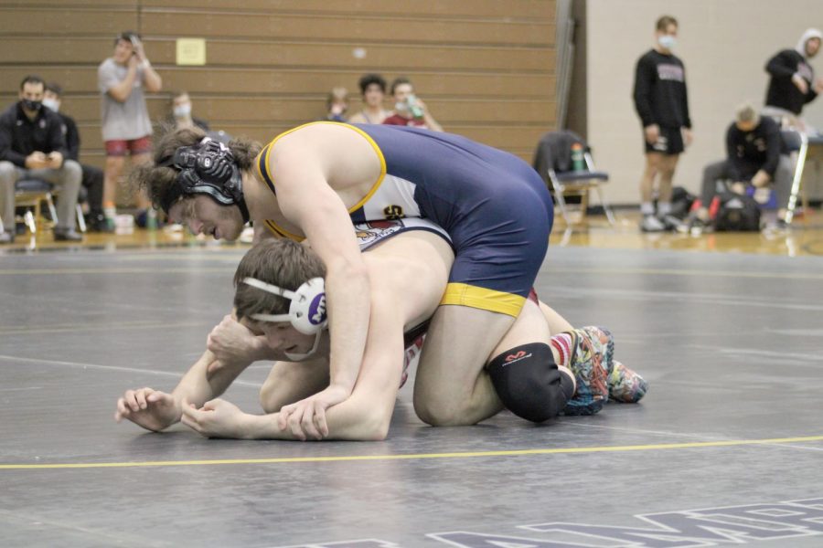 Senior Liam Flaherty controlled his opponent in the second period of his match to earn a 10-7 decision in hopes of leading the Colonels to victory.