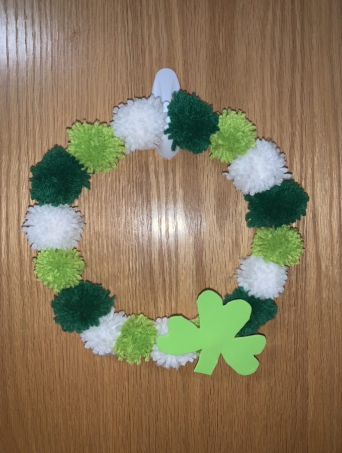 6) Hot glue the shamrock onto the wreath and enjoy!