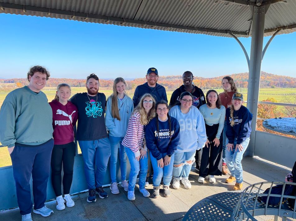 During one Honors outing, students traveled to Gettysburg where they toured the battlefields, did some shopping and went on a ghost tour. First row, from left, are Kamea Paresa, Mollie Corbett, Zoe Morley, Reagan Weldon-Peri and Jen McLaughlin. Second row, are Zak Sova, Kasey Gress, Ethan Warner, Sydney Ahrberg, Dr. Kuiken, Jada Acheampong, Lauren Patrick.