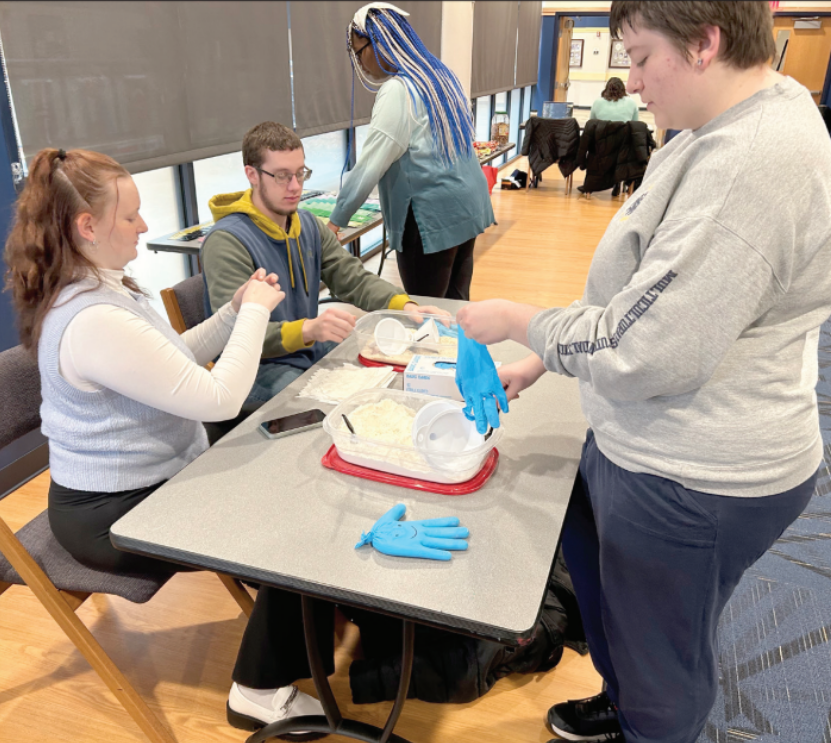 FROM LEFT TO RIGHT: Ashley Gangaware, Jacob Siek, Aster Rowland and Morgan Steiner making stress toys.