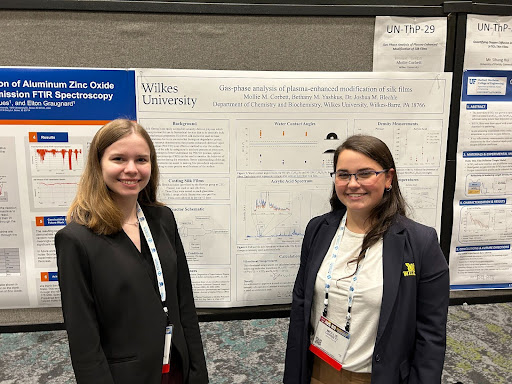 Bethany Yashkus (left) and Mollie Corbett (right) st the American Vacumm Society (AVS) Conference in Oregon. The two presented an original research project, titled Gas-Phase Analysis of Plasma Enhanced Modification of Silk Films.