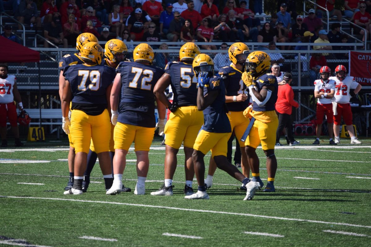 The Colonel offense gets ready to start a drive. 